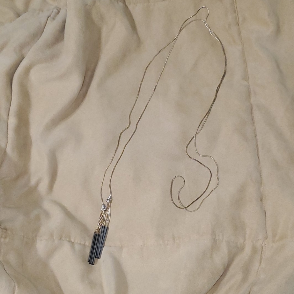 Long dual tassel necklace